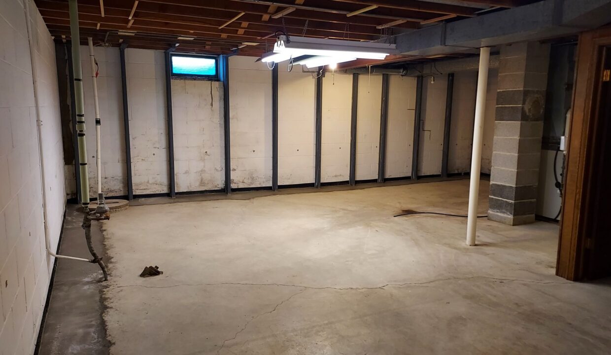 8030 S Waring - Basement repair